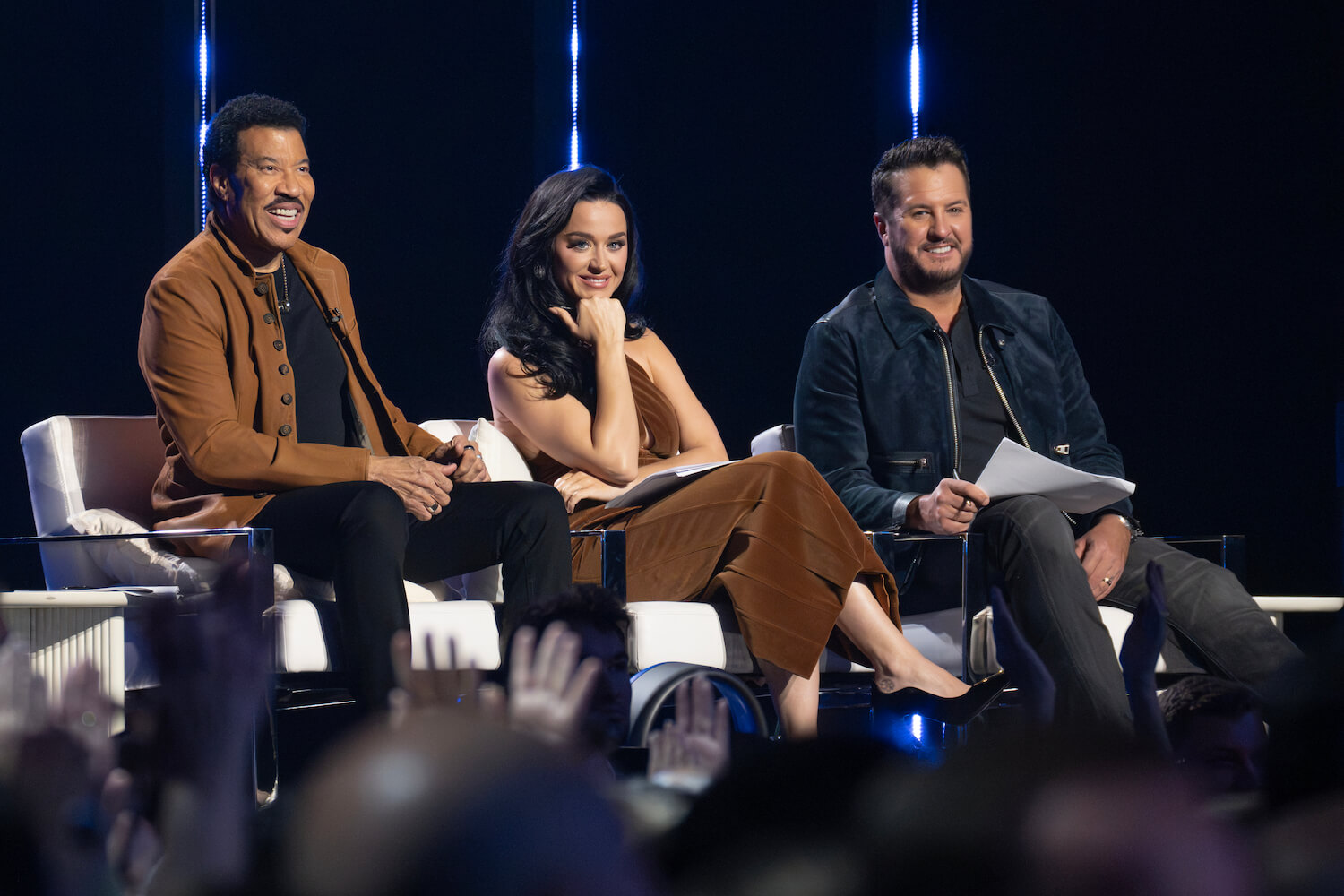 Lionel Richie, Katy Perry, and Luke Bryan sitting next to each other as judges on 'American Idol' Season 22