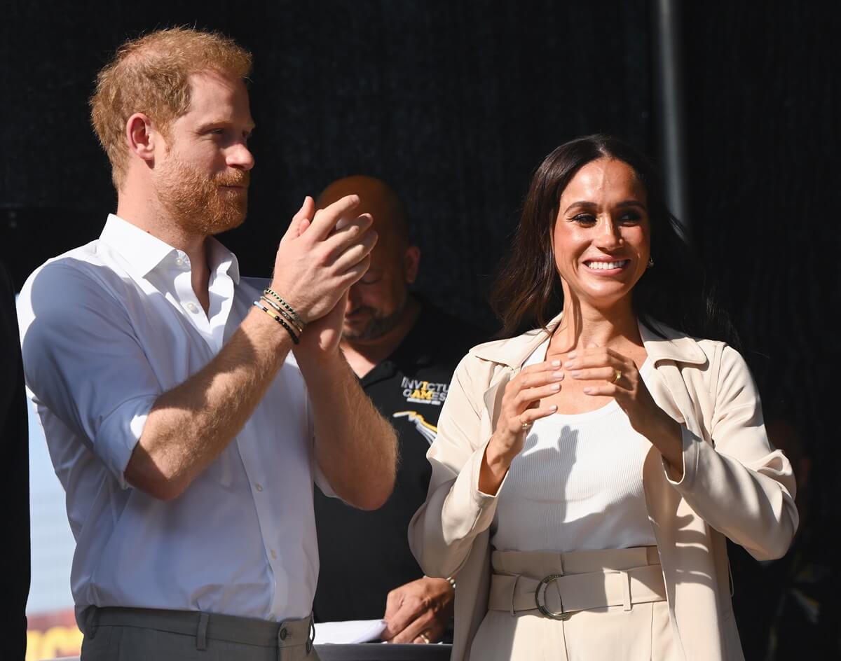 Meghan Markle Has Awkward Moment Trying to Get a Woman Away From Prince ...