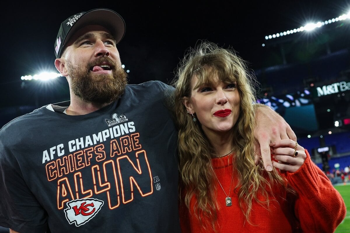 Travis Kelce with his arm around Taylor Swift after a football game