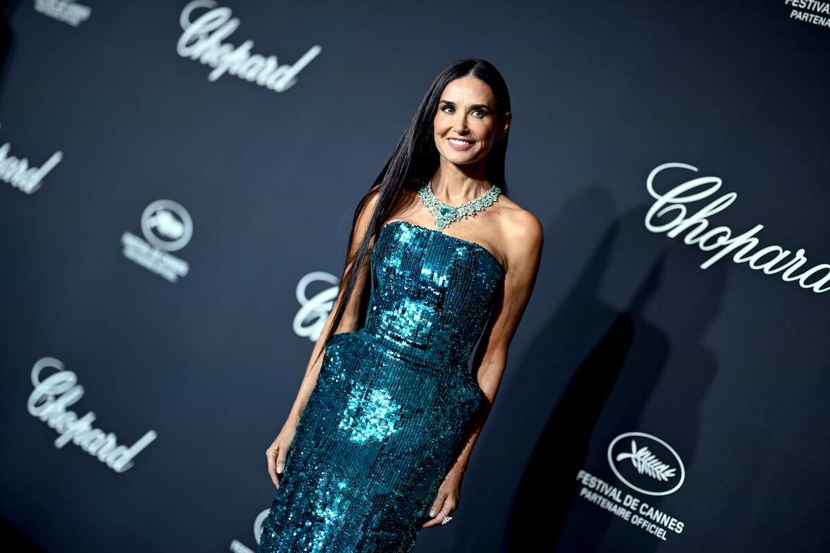 Actor Demi Moore wears a turquoise sequin gown to a Chopard event