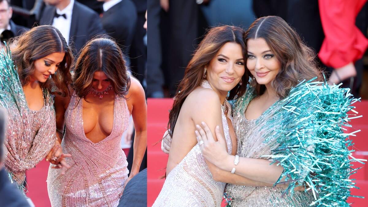 Celebrities Aishwarya Rai Bachchan and Eva Longoria hug each other while they take a photo on the Cannes red carpet