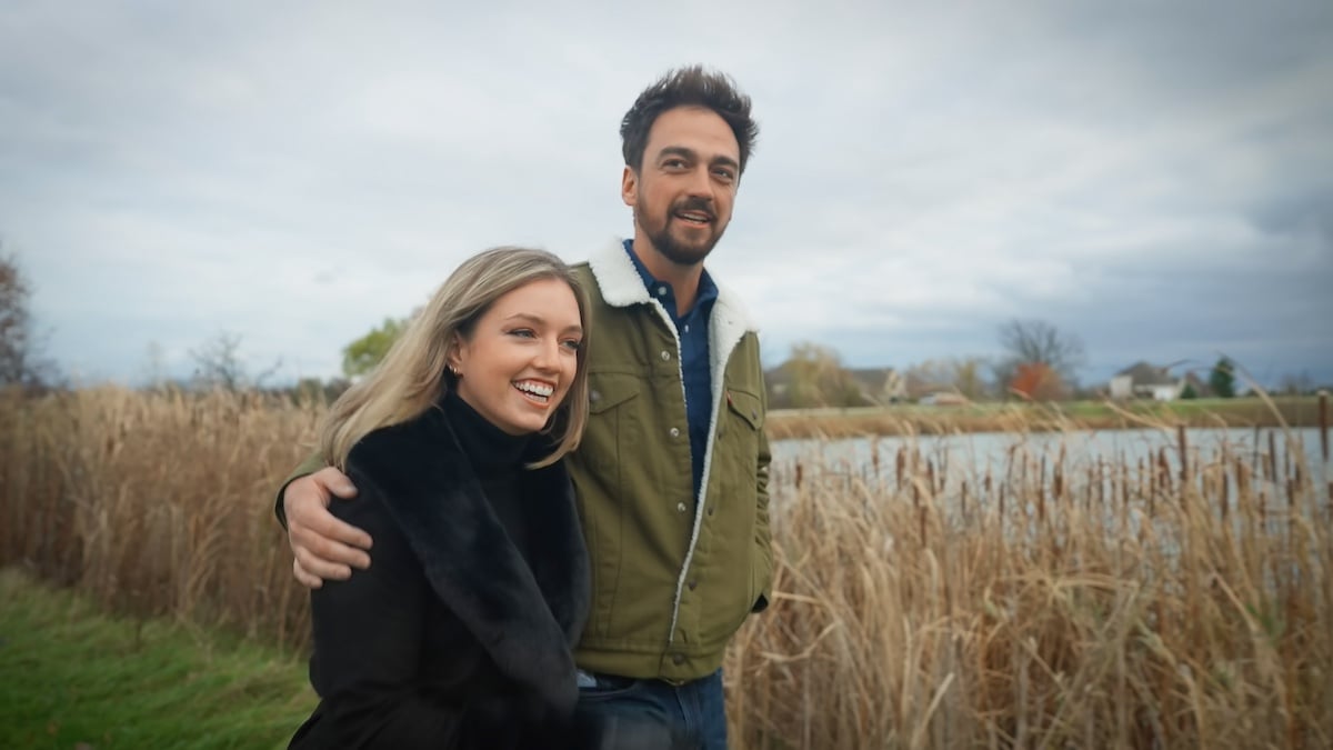 Brandon and Grace walking by a pond in 'Farmer Wants a Wife'