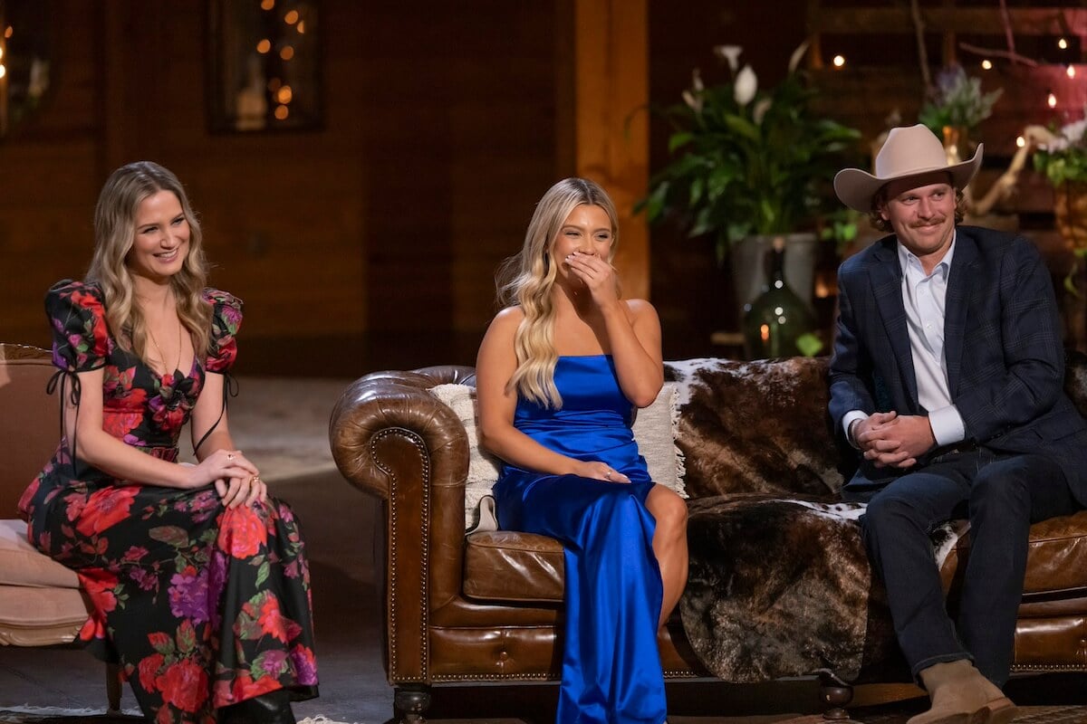 Jennifer Nettles, Taylor, and Nathan sitting on a couch at the 'Farmer Wants a Wife' Season 2 reunion