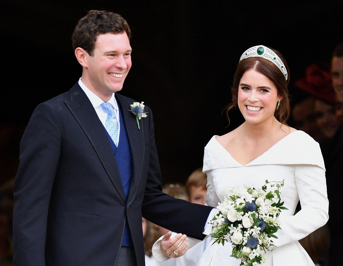 Jack Brooksbank and Princess Eugenie leave St. George's Chapel after their wedding ceremony