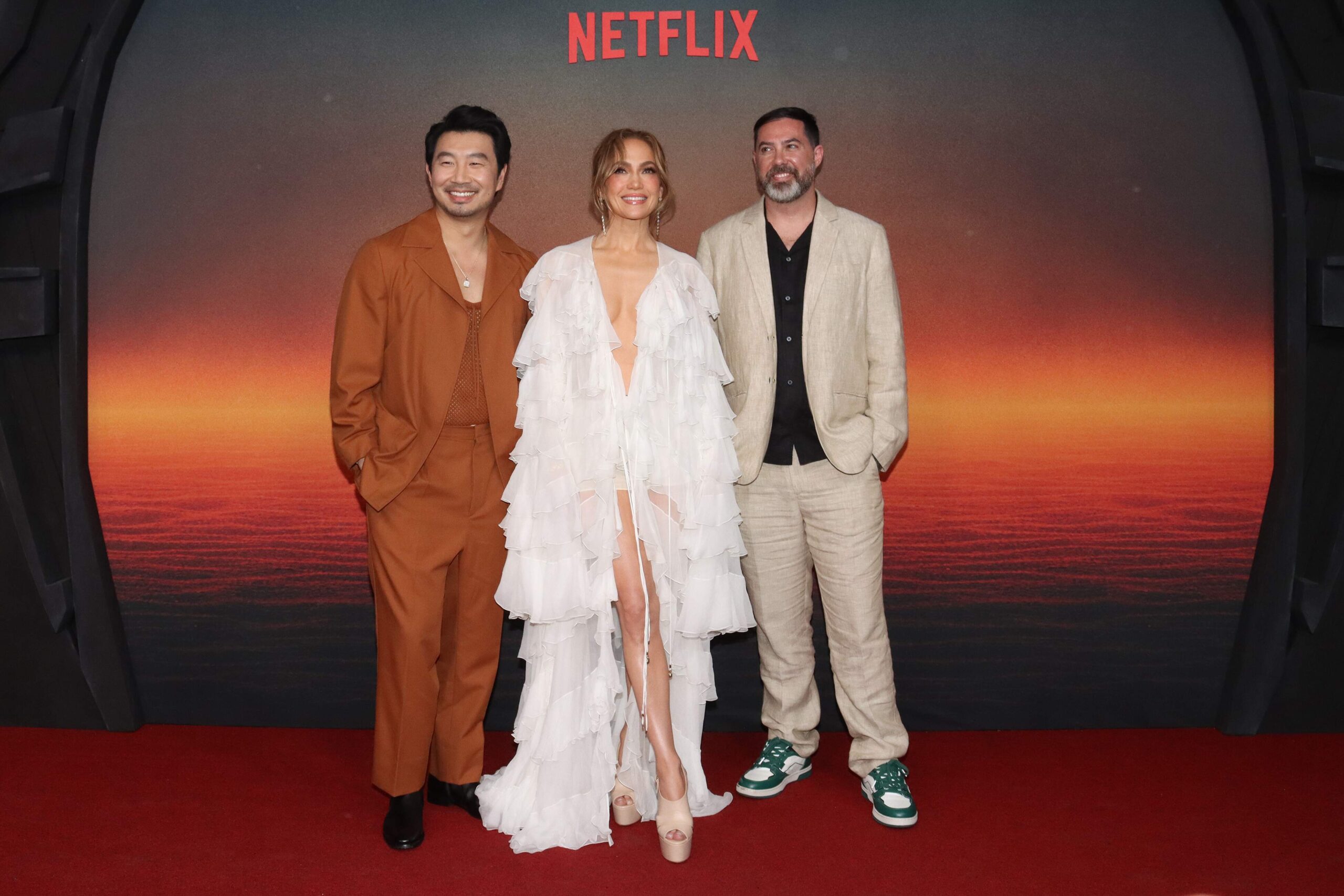 Atlas star Simu Liu, Jennifer Lopez, and Brad Peyton pose together during the 'Atlas' Mexico City Fan Event