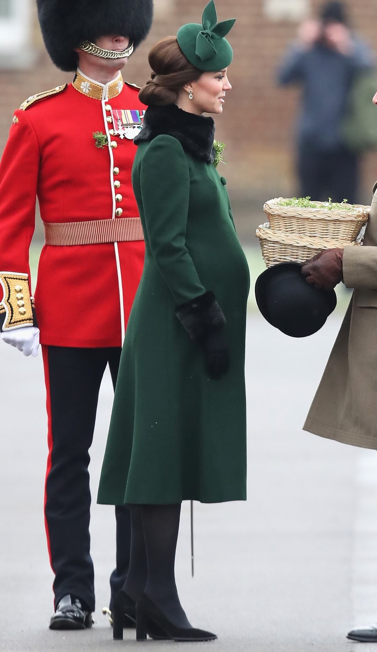 Kate Middleton presents the 1st Battalion Irish Guardsmen with shamrocks during the Irish Guards St Patrick's Day Parade