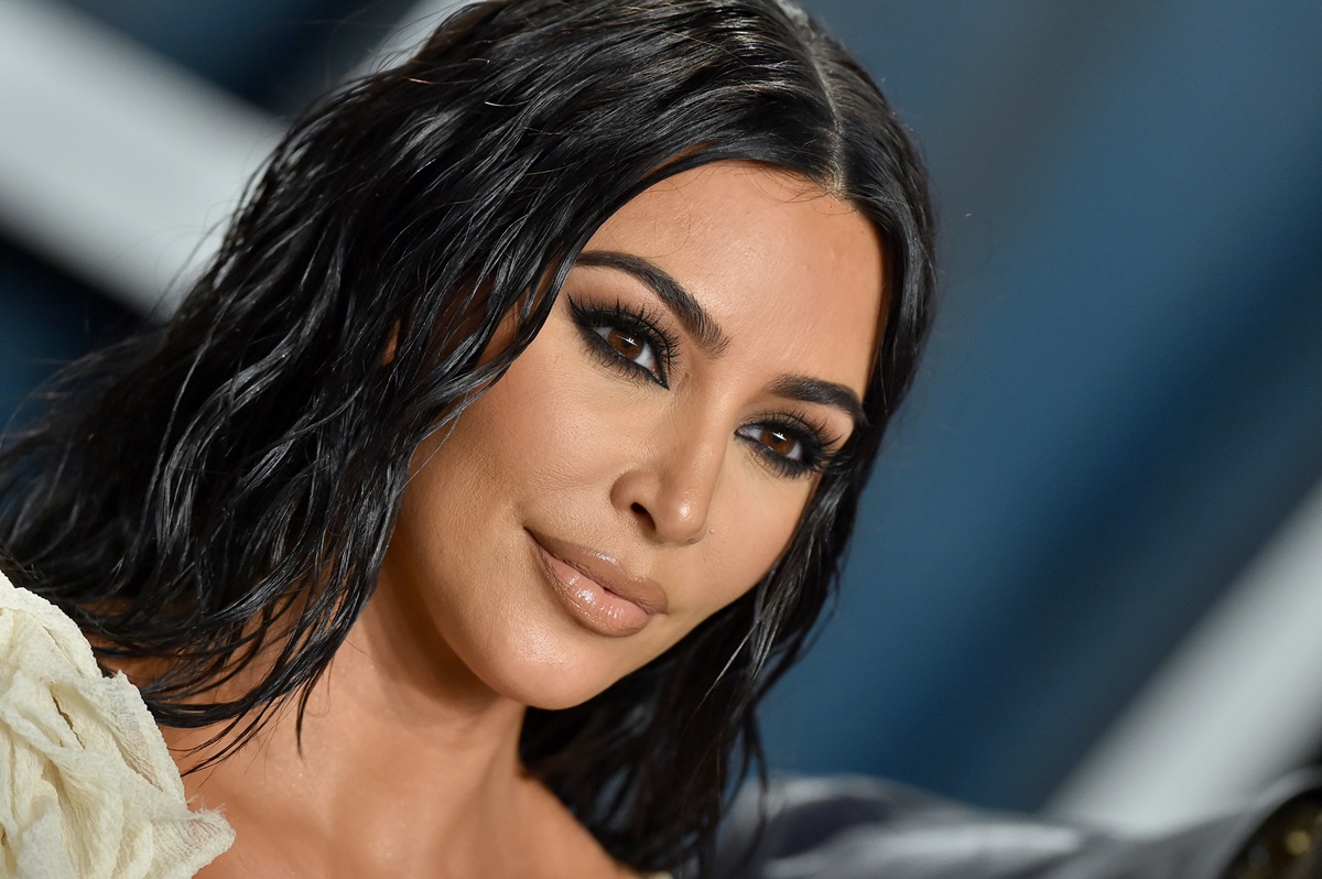 Kim Kardashian West posing at the 2020 Vanity Fair Oscar Party.