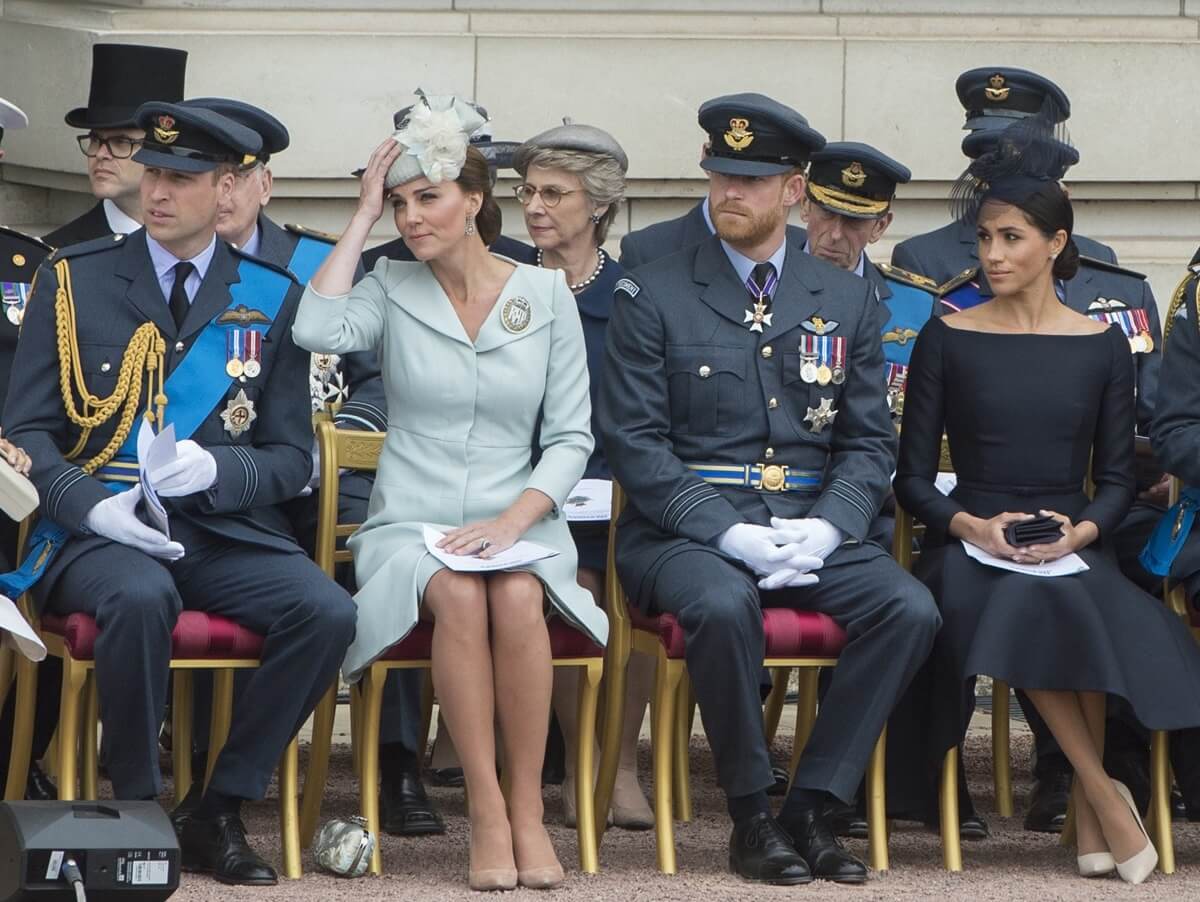 Prince William, Kate Middleton, Prince Harry, and Meghan Markle during the RAF 100 ceremony at Buckingham Palace