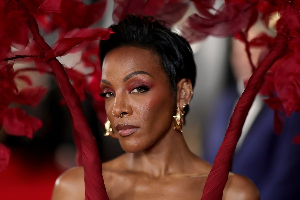 Former Danity Kane member Dawn Richard posing at the Grammys while wearing a red dress.