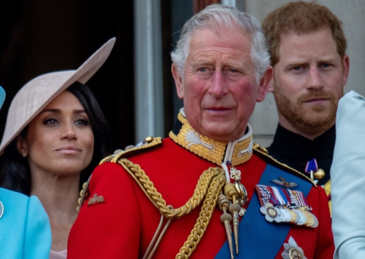 Then-Prince Charles with Prince Harry and Meghan Markle on the balcony during Trooping The Colour 2018