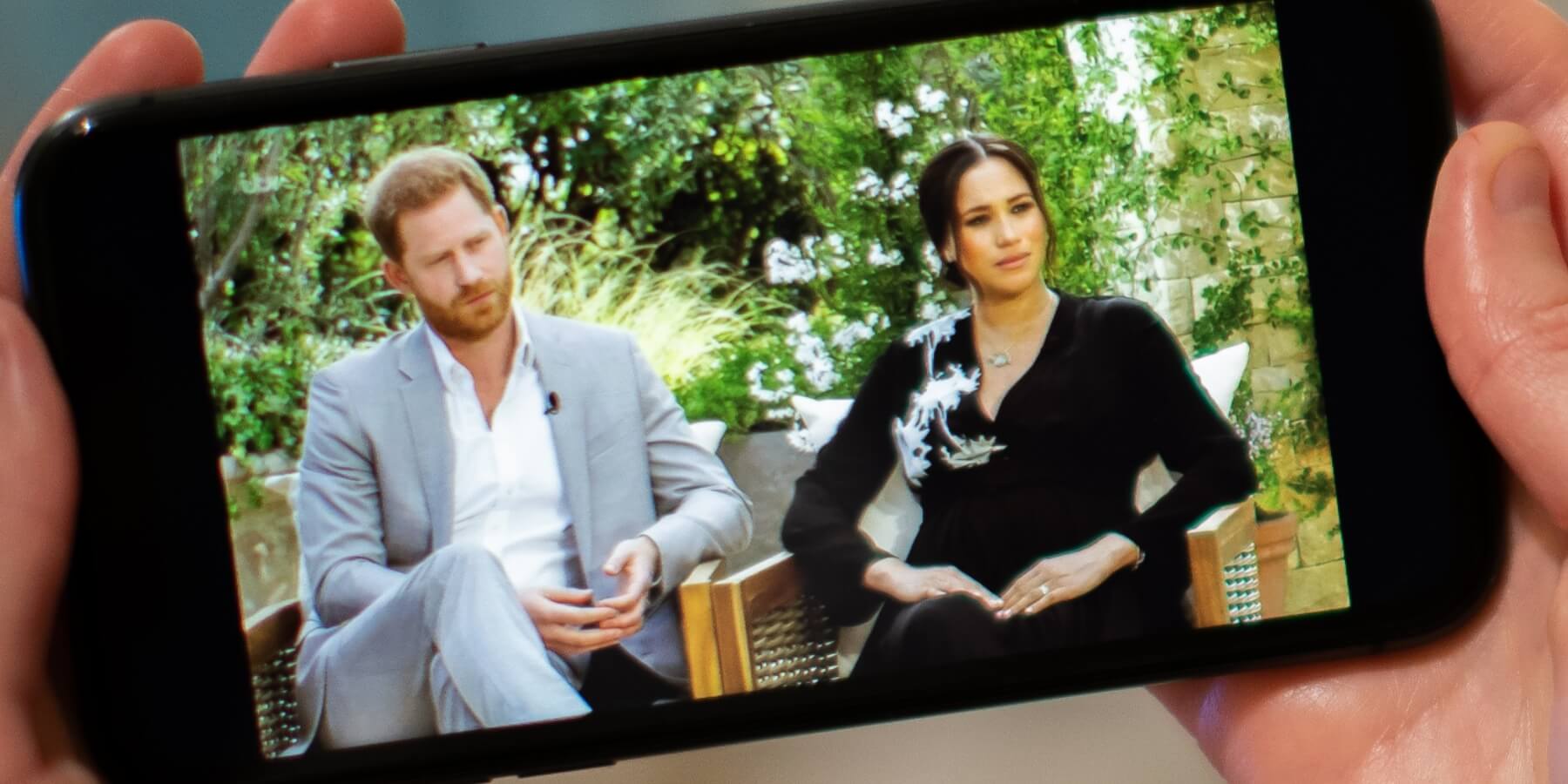 Prince Harry and Meghan Markle speaking with Oprah Winfrey in 2021