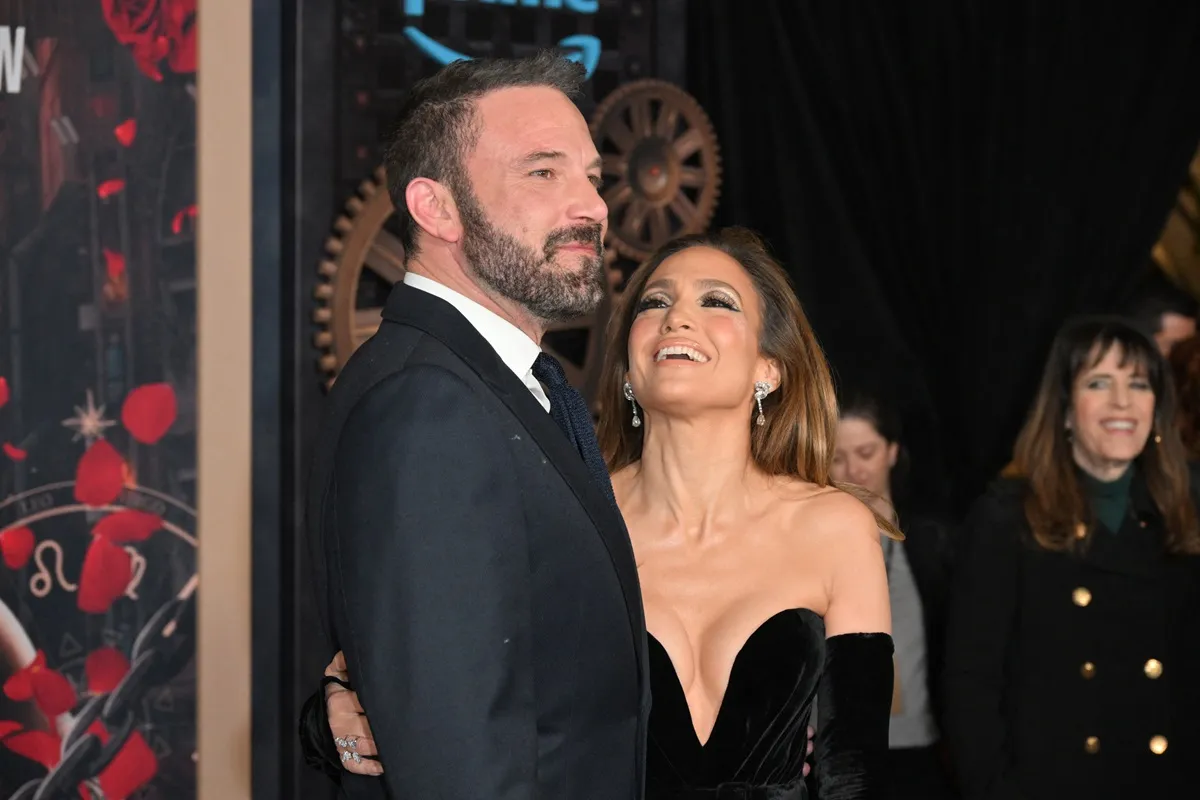 Jennifer Lopez smiling at Ben Affleck at the 'This is Me... Now: A Love Story' premiere