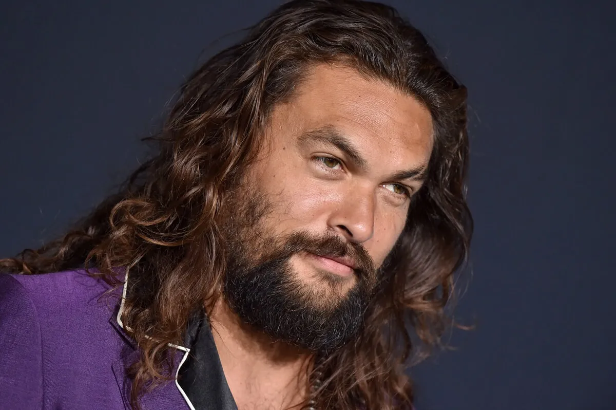 Jason Momoa posing at the premiere of 'Joker'.