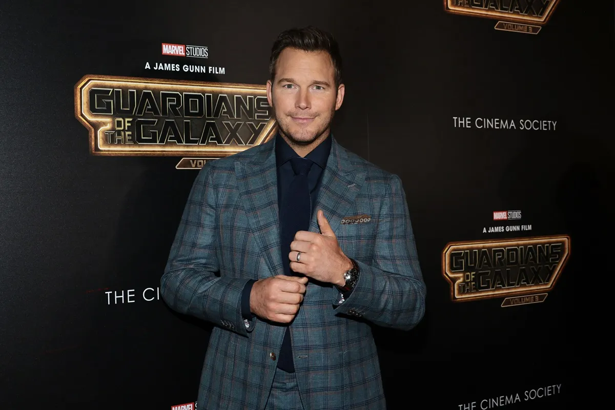 Chris Pratt posing at the premiere of 'Guardians of the Galaxy Vol. 3' in a suit,