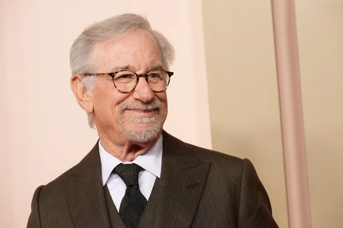 Steven Spielberg at the 96th Oscars Nominees Luncheon while wearing a suit.