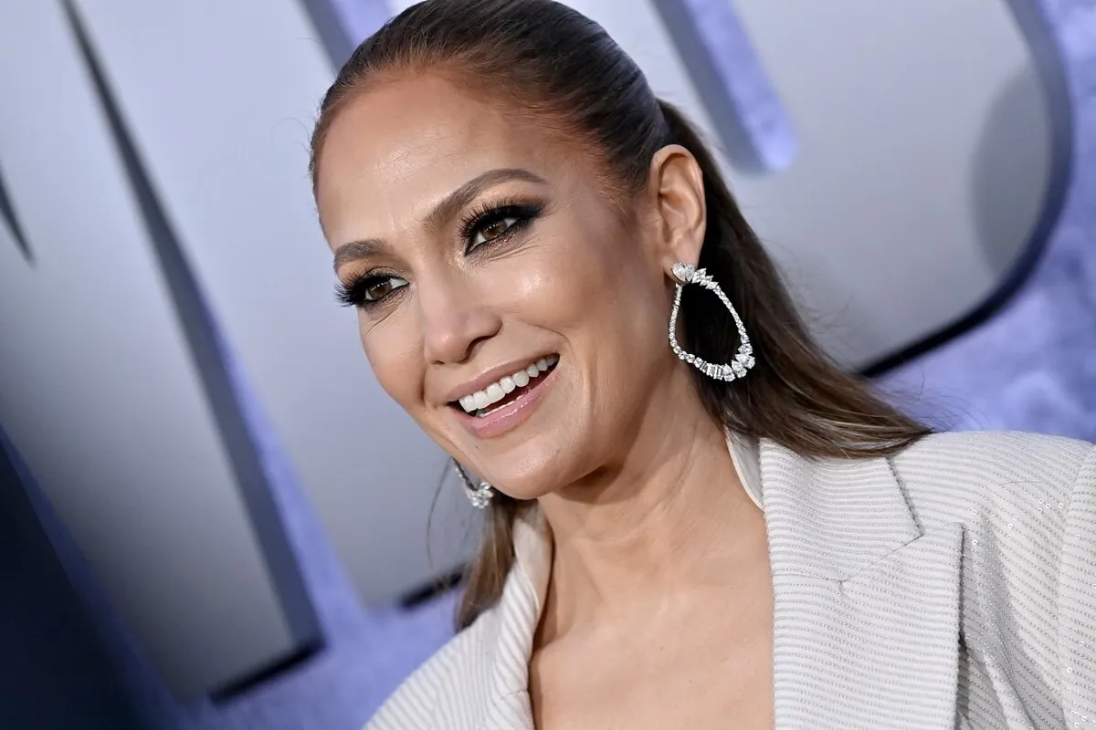 Jennifer Lopez posing in a white blazer at the premiere of 'The Mother'.
