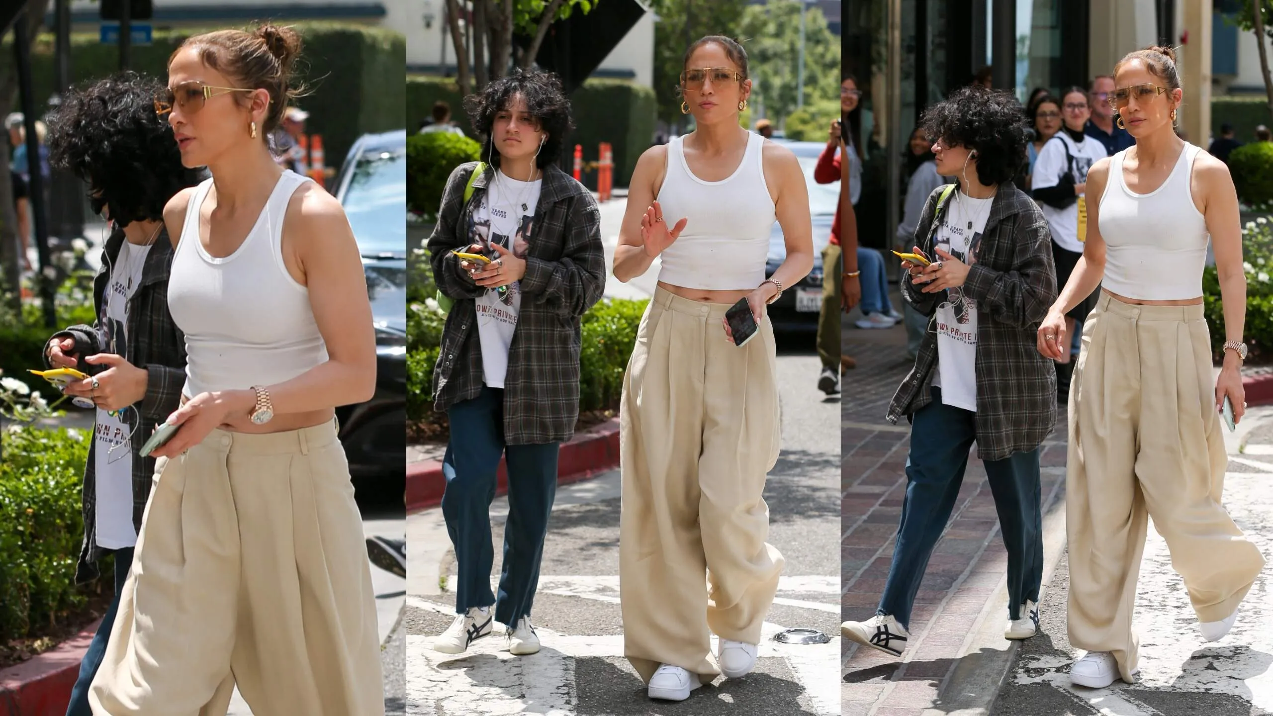Singer Jennifer Lopez walks around The Grove in LA with her child Emme
