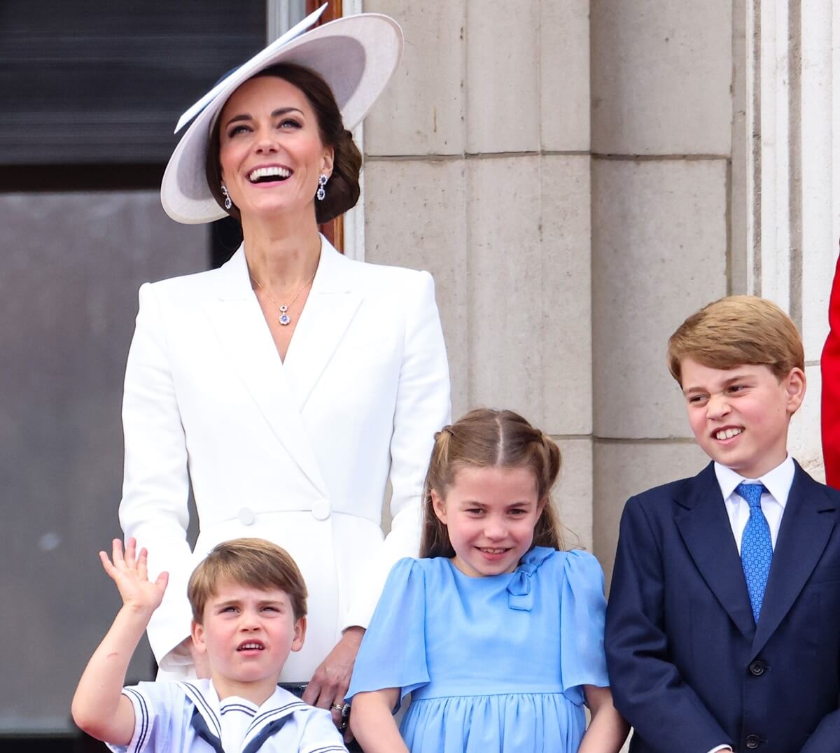 Kate Middleton, Prince Louis, Princess Charlotte, and Prince George watch the RAF flypast on the balcony of Buckingham Palace during the Trooping the Colour parade