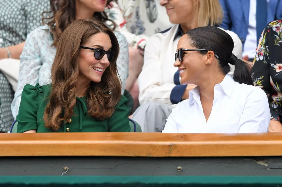 Kate Middleton and Meghan Markle in the Royal Box on Centre Court during the Wimbledon Tennis Championships
