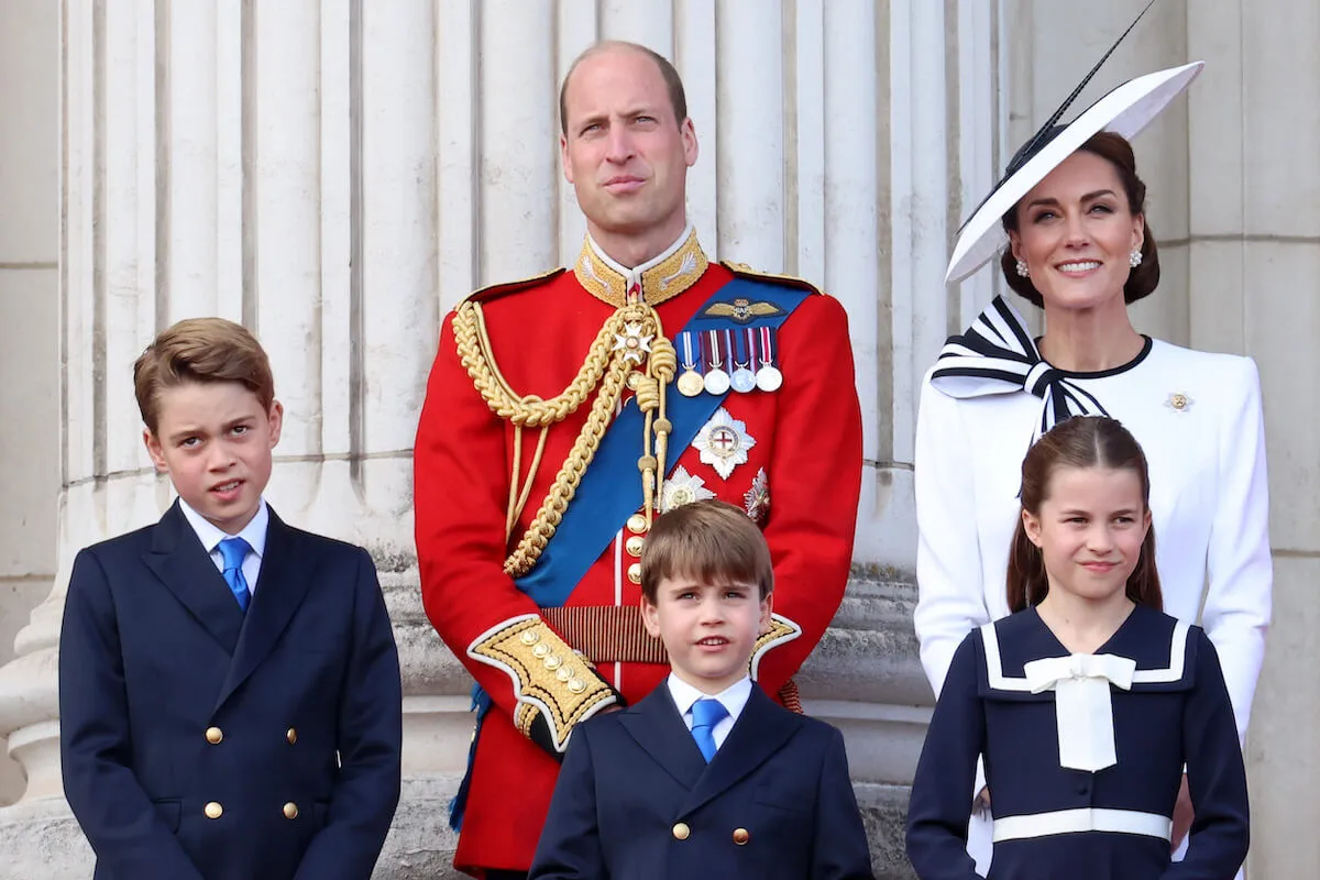 Kate Middleton, who sent a message with Prince William's birthday photo, stands with the Wales family