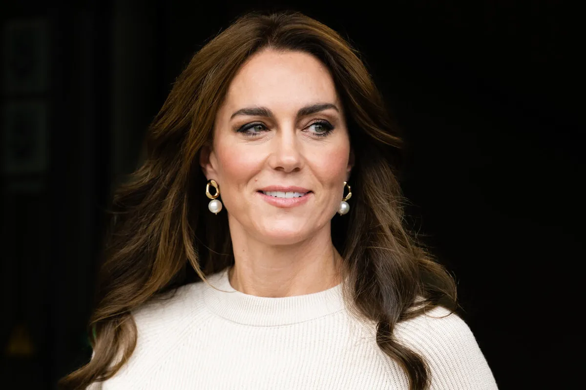 Kate Middleton, who will reportedly release a video before returning to royal duties and public life, looks on