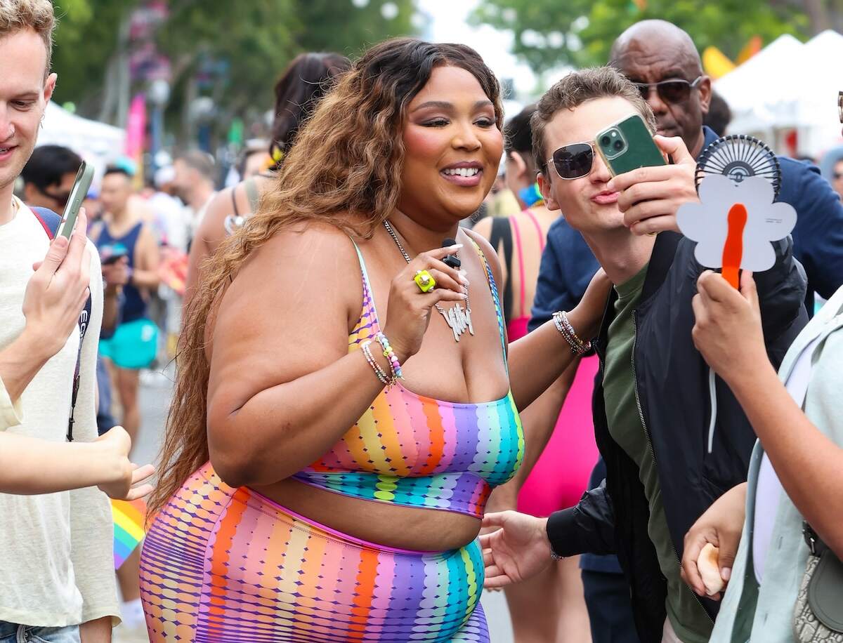 Singer Lizzo takes a selfie with a fan at the WeHo Pride Parade