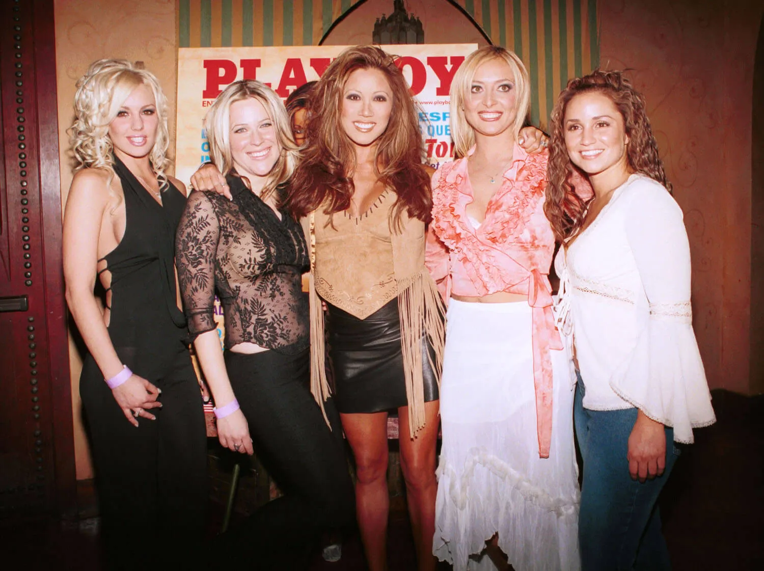 Playboy cover model Kiana Tom (C) poses with model Christi Shake (L), MTV's Beth Stolarczyk ('The Real World: Los Angeles,' 1992), Flora Alekseyeva, and Veronica Portillo ('Road Rules VIII') during the Playboy May Issue Party in 2002