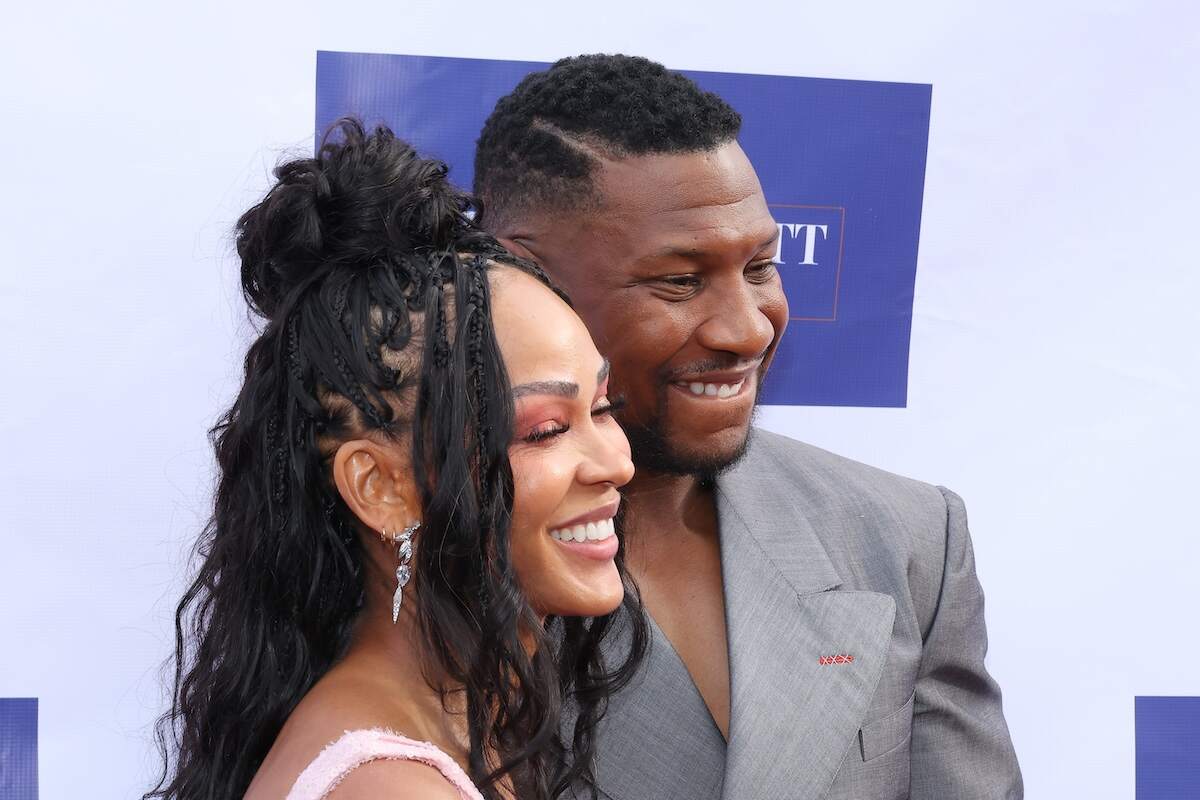 Couple Meagan Good and Jonathan Majors show big smiles on the red carpet at the NAACP Theatre Awards 2024