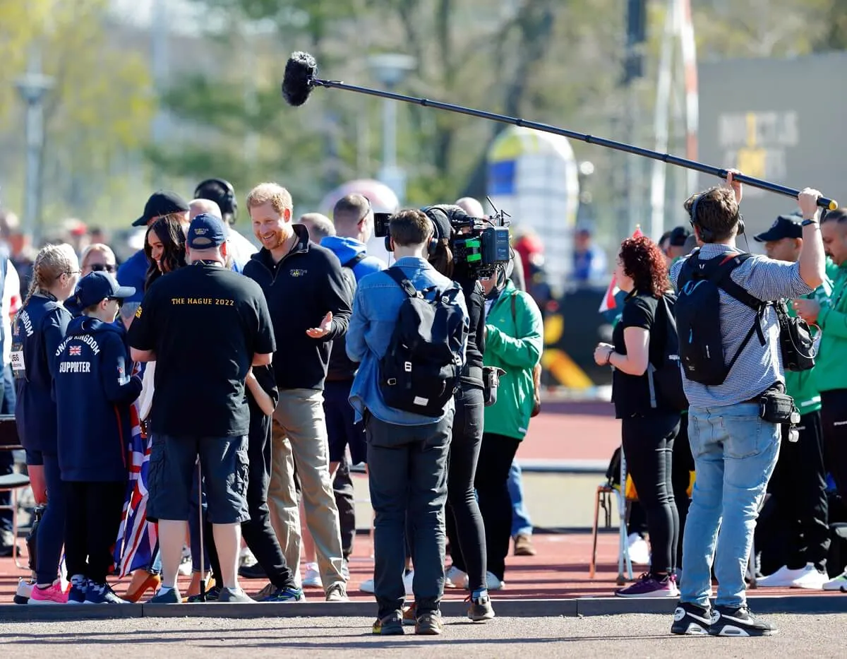 Meghan Markle and Prince Harry (accompanied by a film crew) meet athletes and supporters of the Invictus Games in The Hague, Netherlands