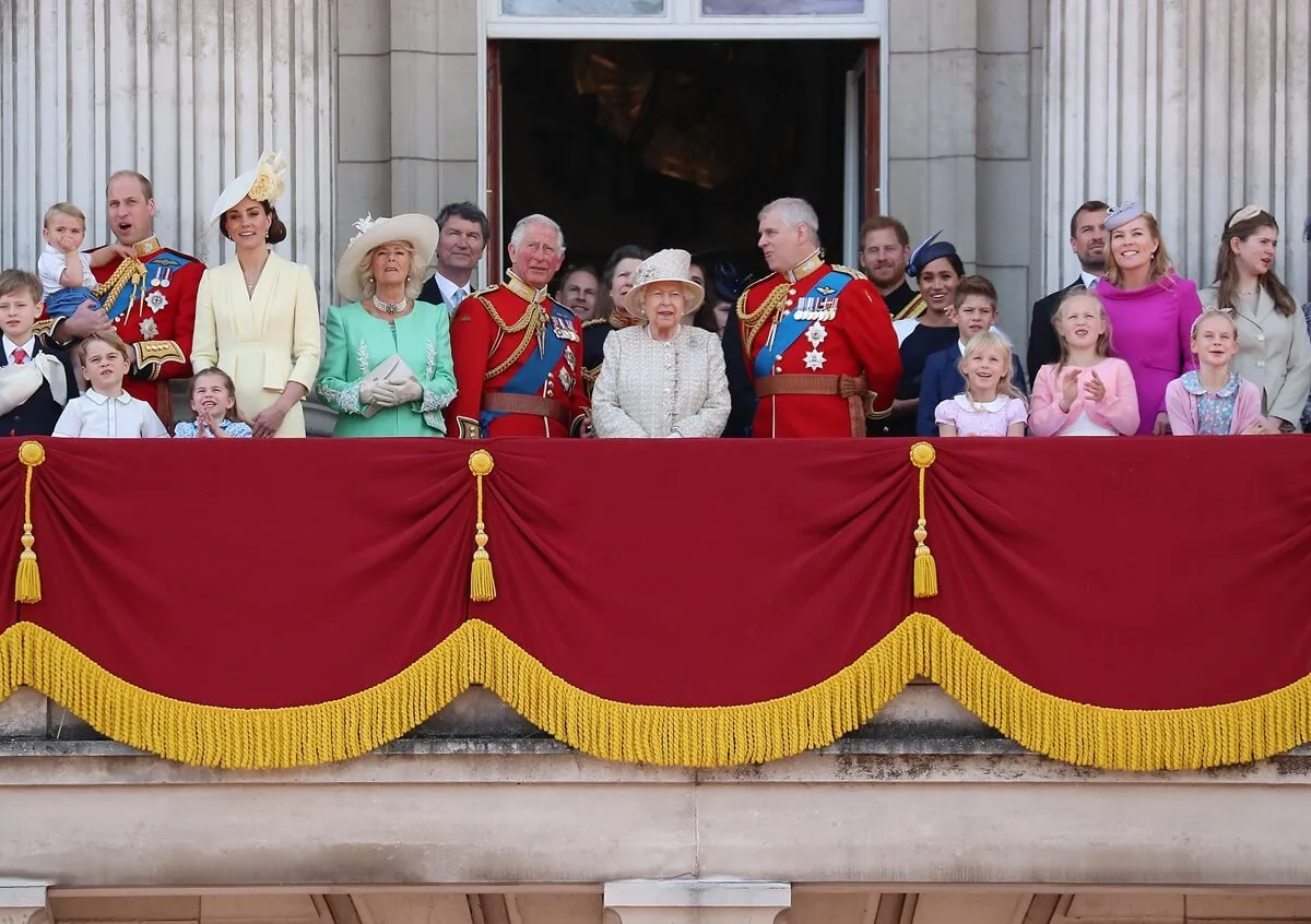 Members of the royal family standing on the balcony of Buckingham Palace during Trooping The Colour