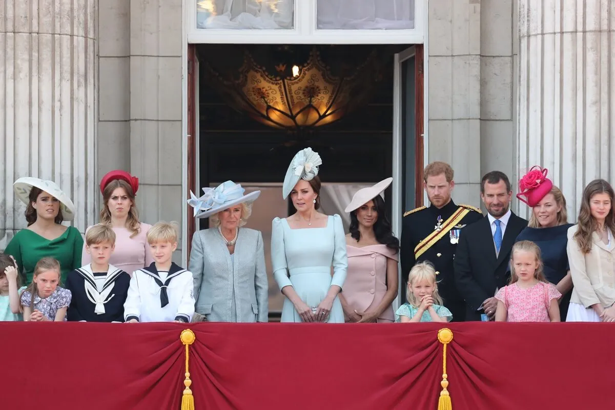 Members of the royal family standing on the balcony of Buckingham Palace during Trooping The Colour