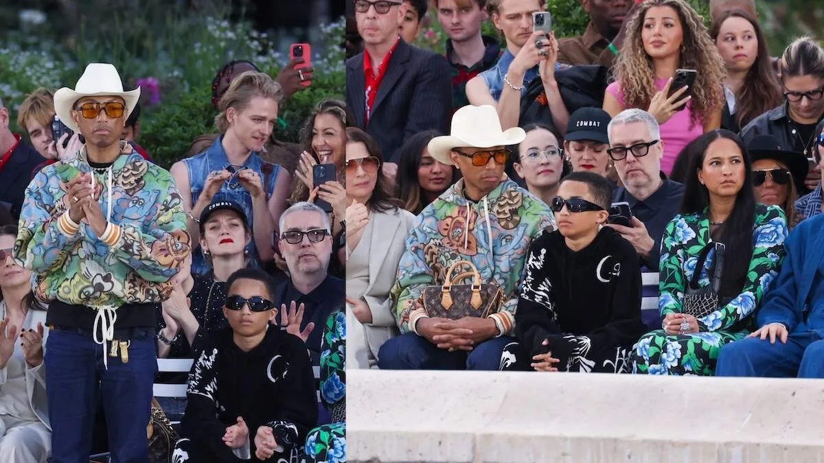 Musician Pharrell Williams sits front row at a fashion show with his son, Rocket Williams, and wife, Helen Lasichanh
