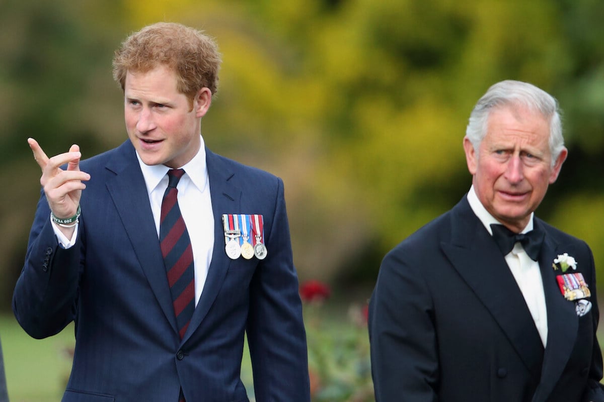 Prince Harry, who can 'get somewhere' with a King Charles renconcilation by normalizing family visits to the U.K. walks with his father in 2015
