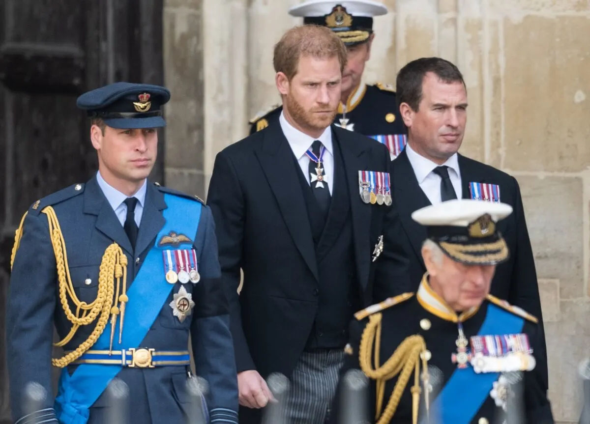 Prince William, Prince Harry, Peter Phillips, and King Charles III during the State Funeral of Queen Elizabeth II at Westminster Abbey