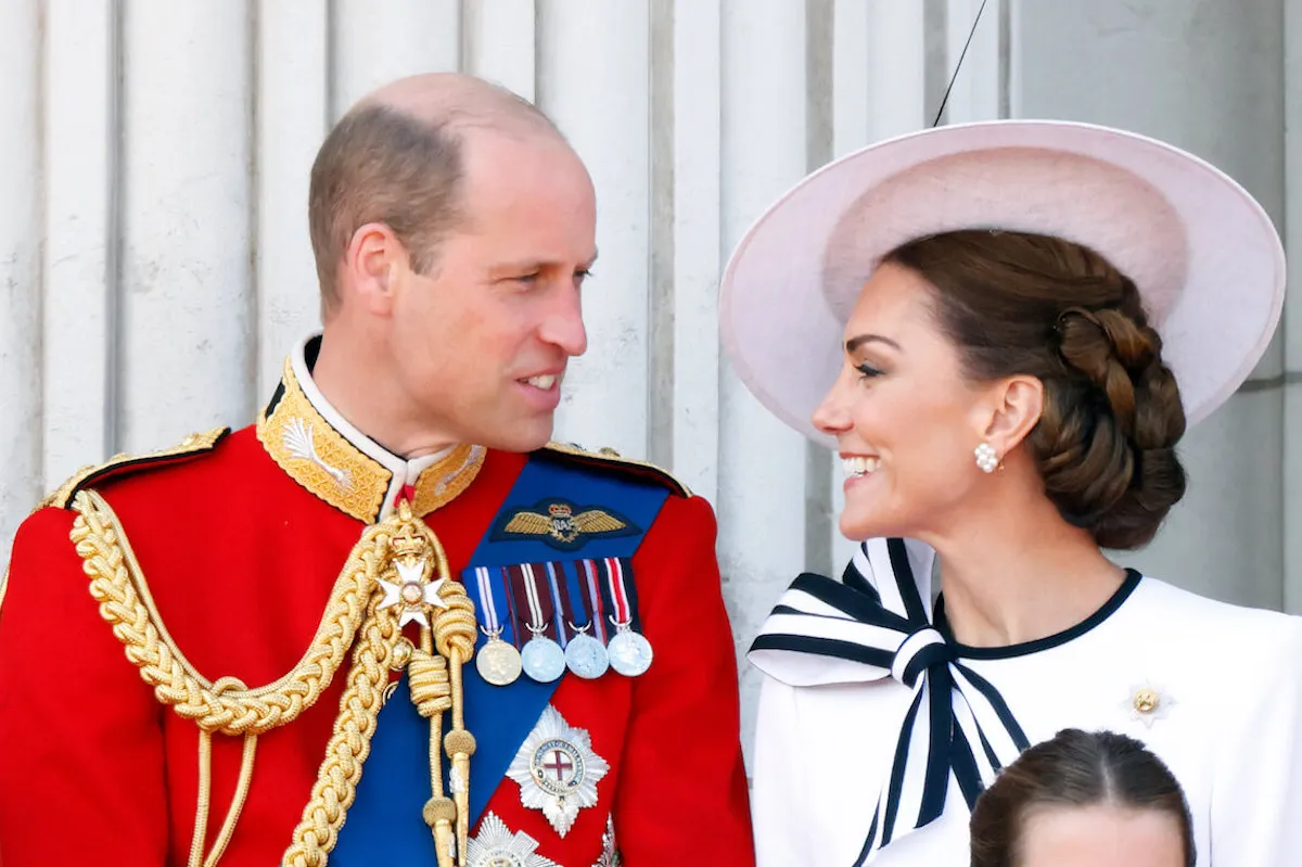 Prince William and Kate Middleton look at each other at Trooping the Colour