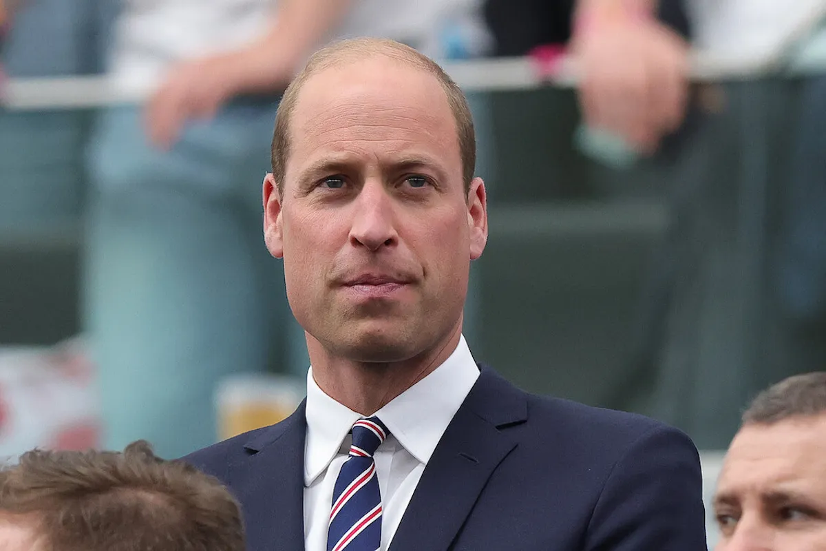 Prince William, whose reaction to viral 'Shake It Off' video, wears a suit