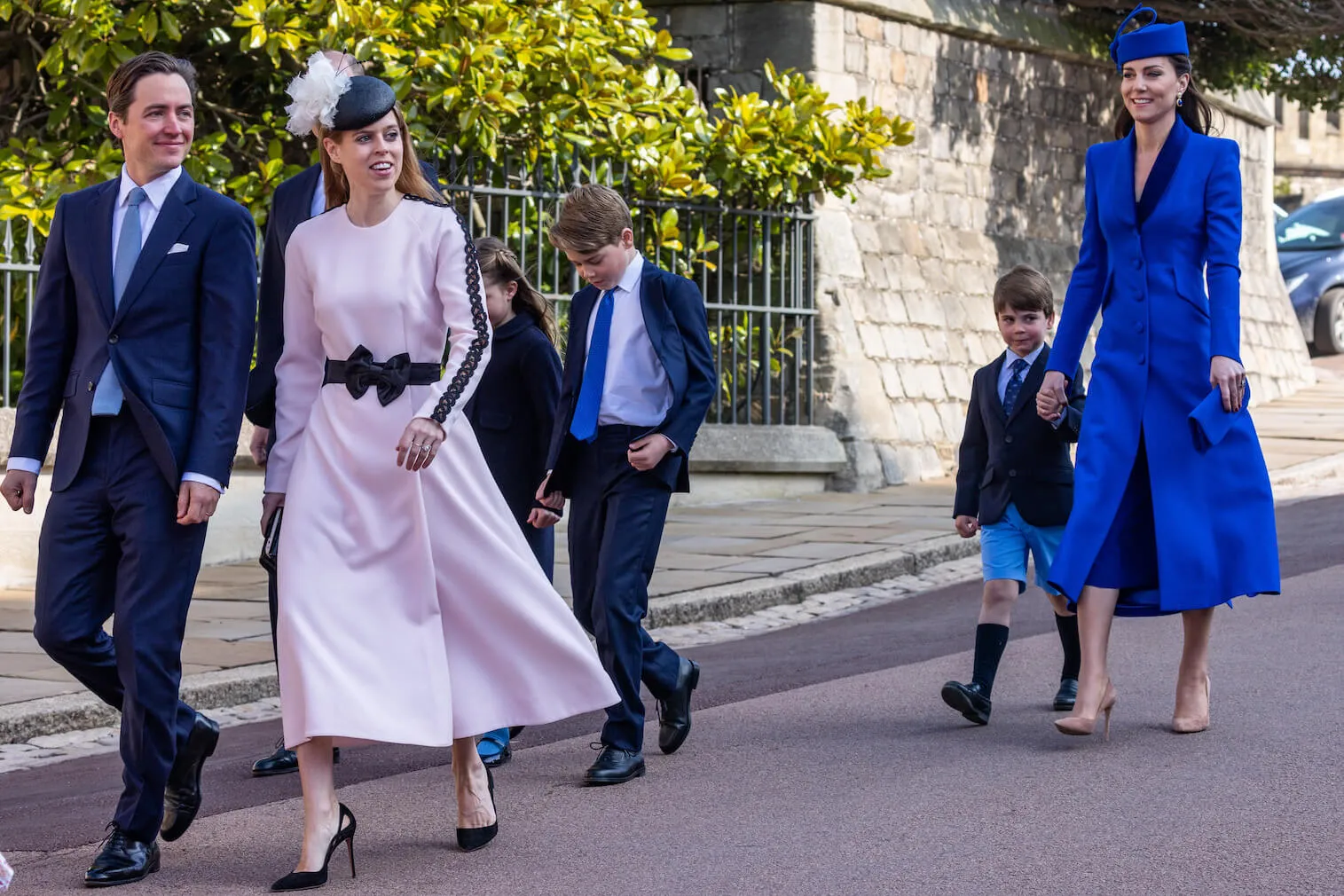 Edoardo Capelli Mozzi walking with Princess Beatrice with Princess Charlotte, Prince George, Prince Louis, and Kate Middleton walking behind