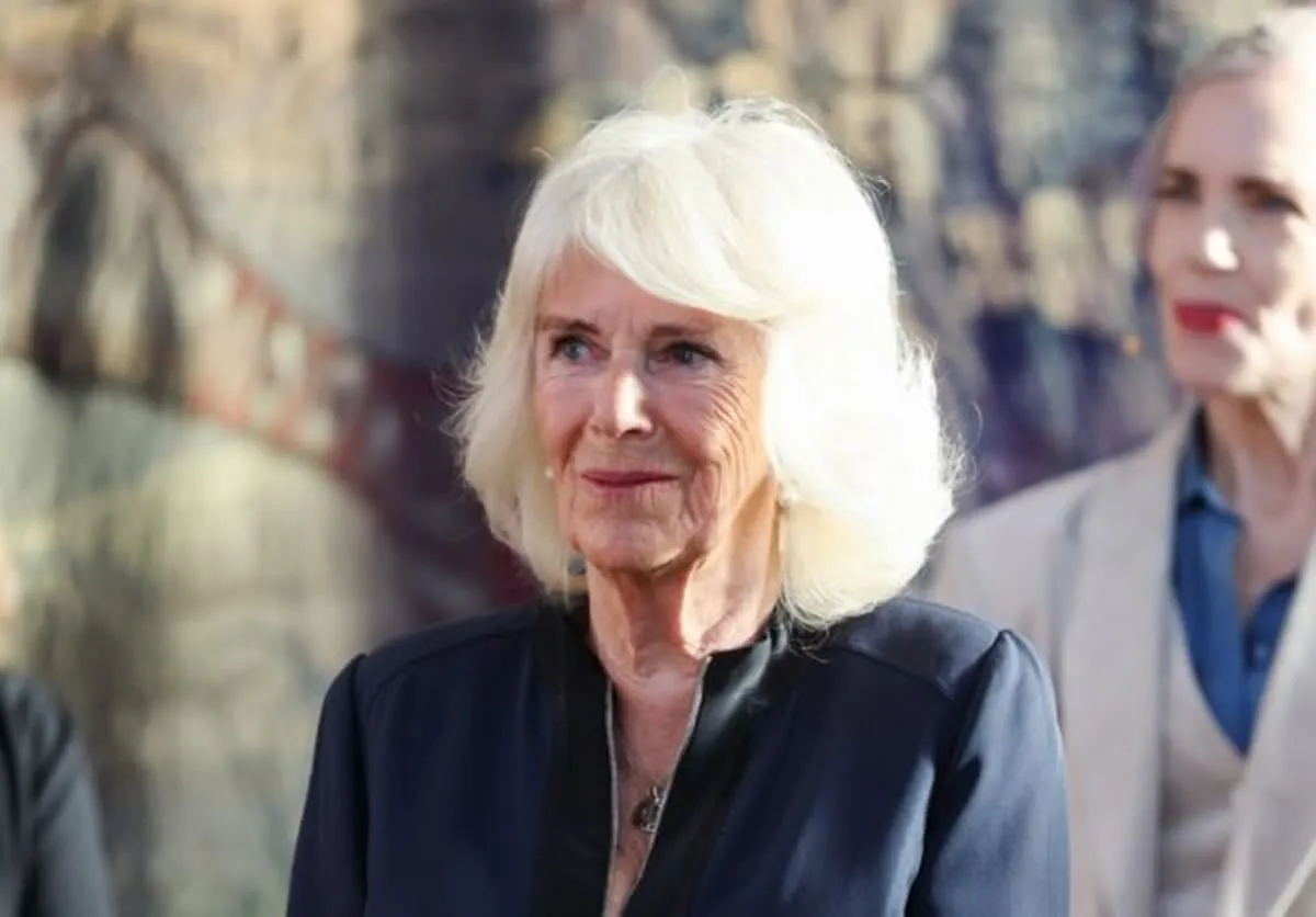 Queen Camilla attends a reception at the Queen's reading room literary festival at Hampton Court Palace