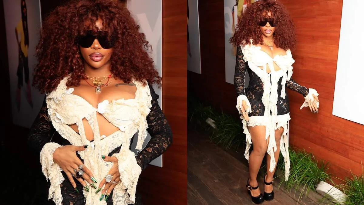 Wearing a black and white ruffled dress, SZA arrives to her sunglass collab launch with Quay at Soho House