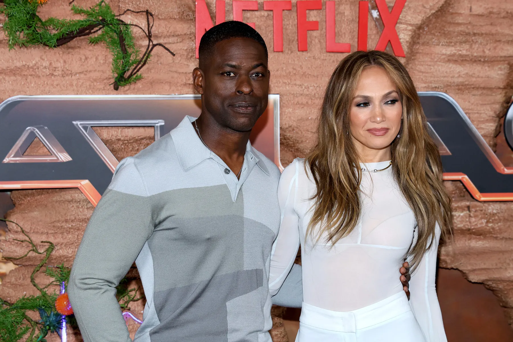 Sterling K. Brown and Jennifer Lopez posing for Netflix's 'Atlas'
