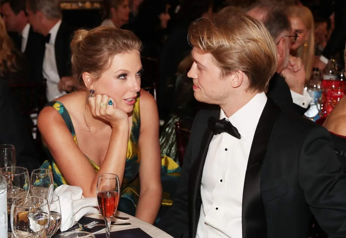 Then-couple Taylor Swift and Joe Alwyn sit together at the 2020 Golden Globe Awards