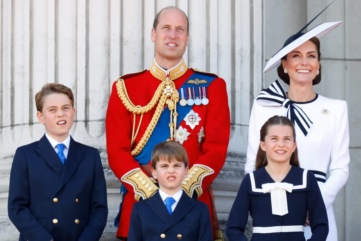 Prince William, Prince George, Prince Louis, Princess Charlotte, and Kate Middleton stand on the Buckingham Palace balcony.
