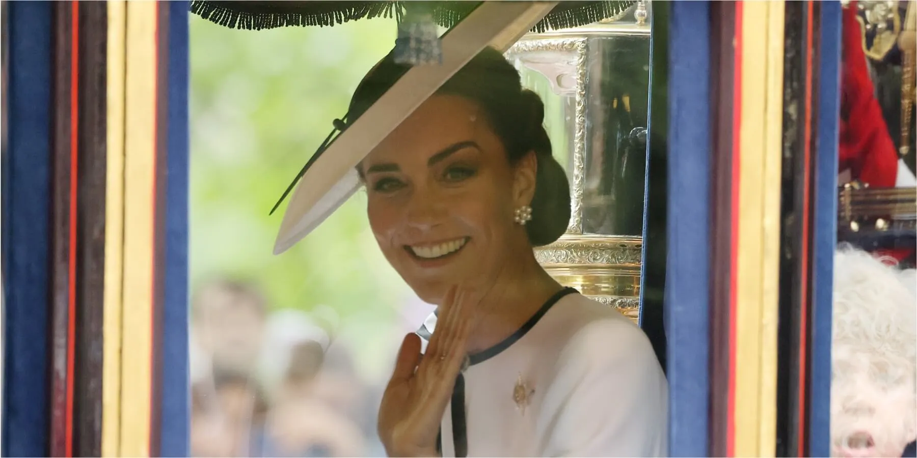 Kate Middleton waves to crowds during Trooping the Color in June 2024.