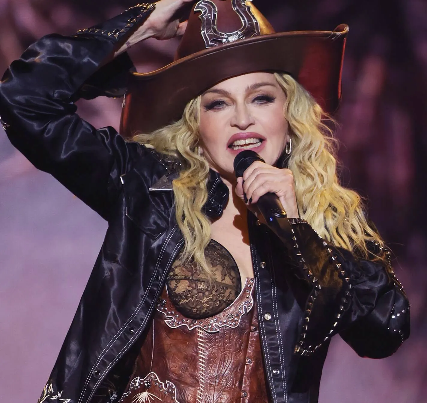 Madonna wearing a cowboy hat