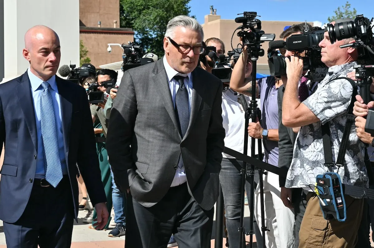 Alec Baldwin leaving court in Santa Fe, surrounded by reporters