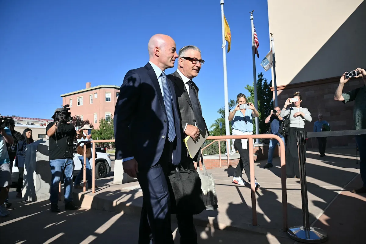 Alec Baldwin and his lawyer walking into court