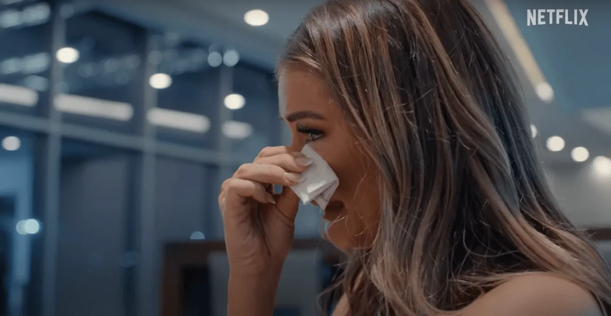 Ari crying in a scene from 'America's Sweethearts: Dallas Cowboys Cheerleaders'