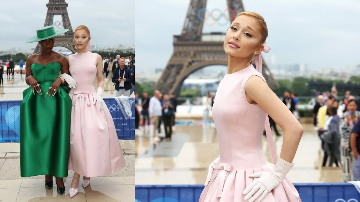 Wearing a pink dress, Ariana Grande poses with Cynthia Ervo in front of the Eiffel Tower