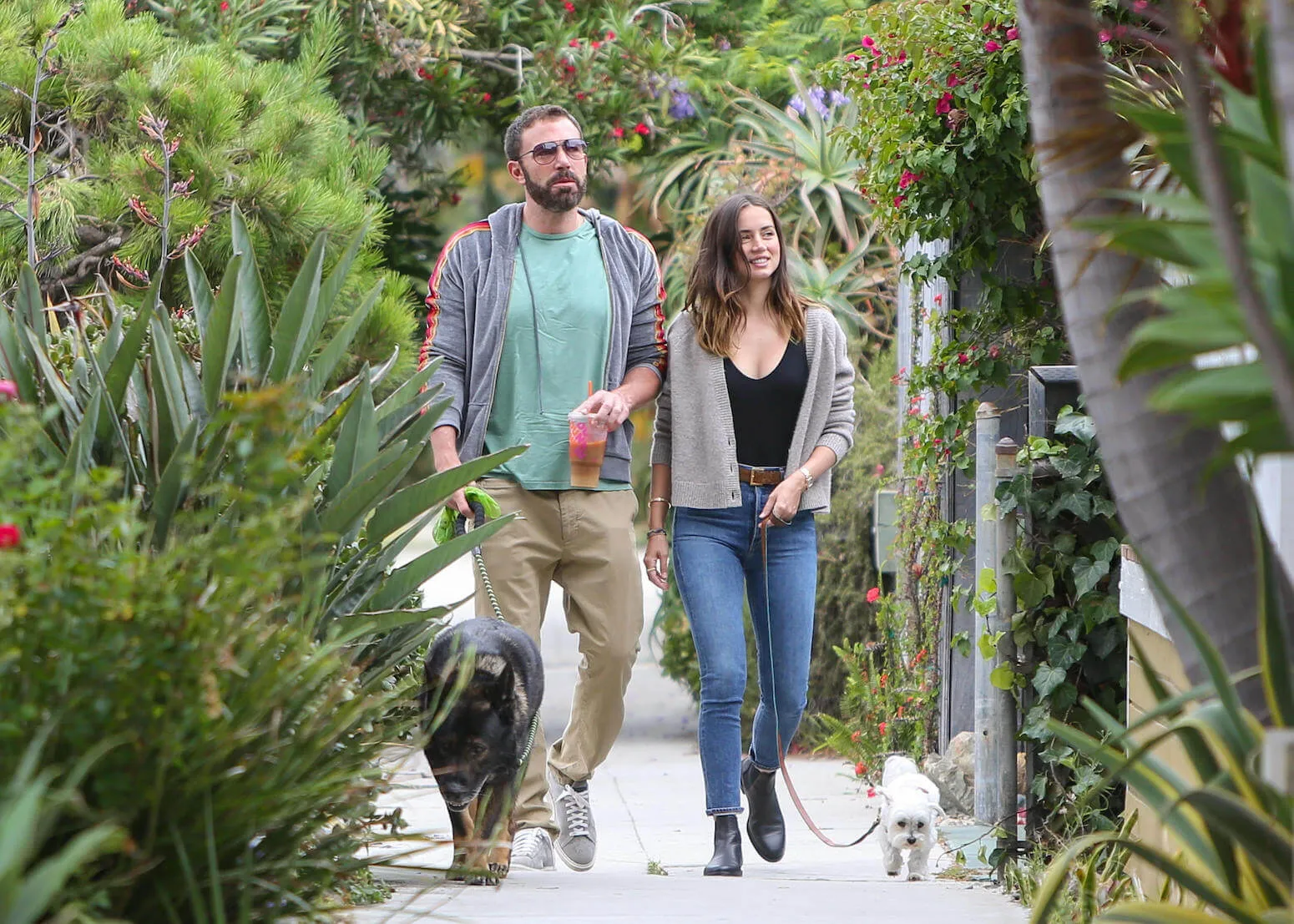Ben Affleck and Ana de Armas on a walk with Affleck's dog in July 2020