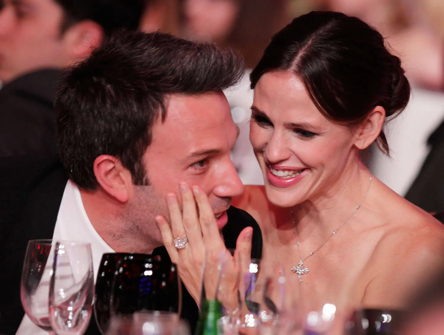 Jennifer Garner smiling and cupping Ben Affleck's face during the 16th annual Critics' Choice Movie Awards in 2011
